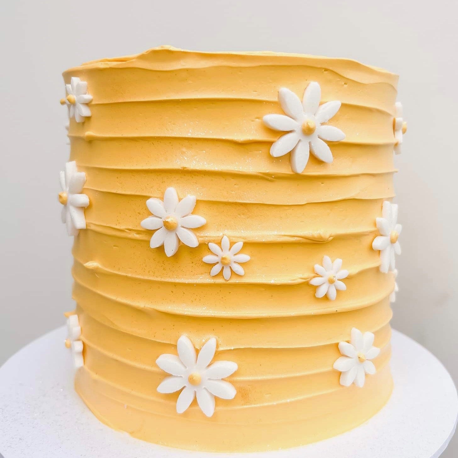 Daisy Cake - We Create Delicious Memories - Oakmont Bakery
